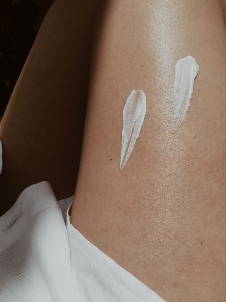 Unperfumed moisturiser on dry leg skin to soothe itching after shaving