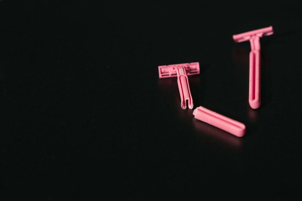 Worn pink disposable razors, a blunt blade being a leading cause of razor burn on the bikini area